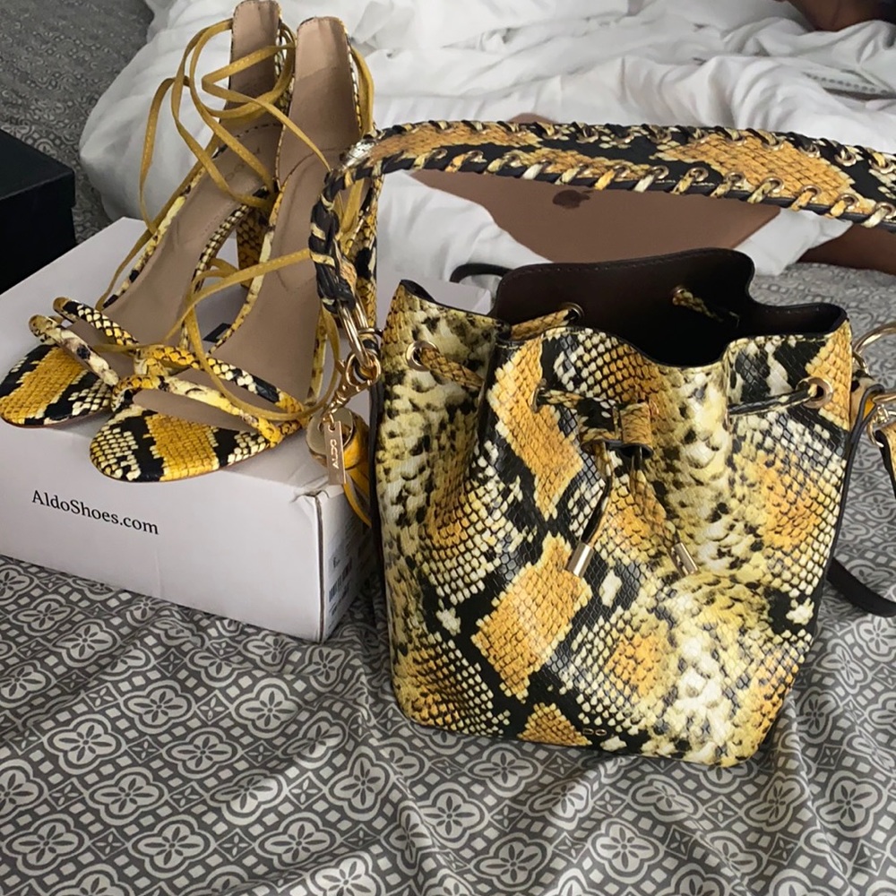 Yellow Aldo snakeskin purse and lace up heels 💛💛